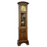 A GERMAN OAK SECESSIONIST STYLE LONGCASE CLOCK WITH BRASS DIAL, C1905, 192CM H