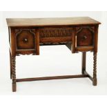 AN OAK DRESSING TABLE WITH SPIRAL TURNED LEGS, 106CM W