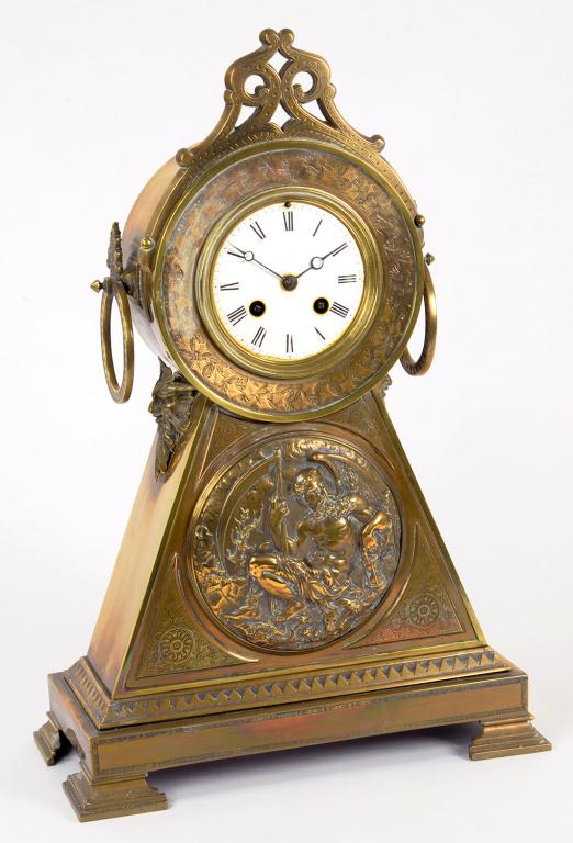 A FRENCH BRASS MANTLE CLOCK, C1890 the triangular base with a relief medallion of Father Time, the - Image 2 of 2