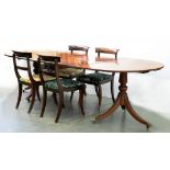 A GEORGE III STYLE MAHOGANY TWIN PILLAR EXTENDING DINING TABLE WITH TWO LEAVES, 272CM EXTENDED AND A