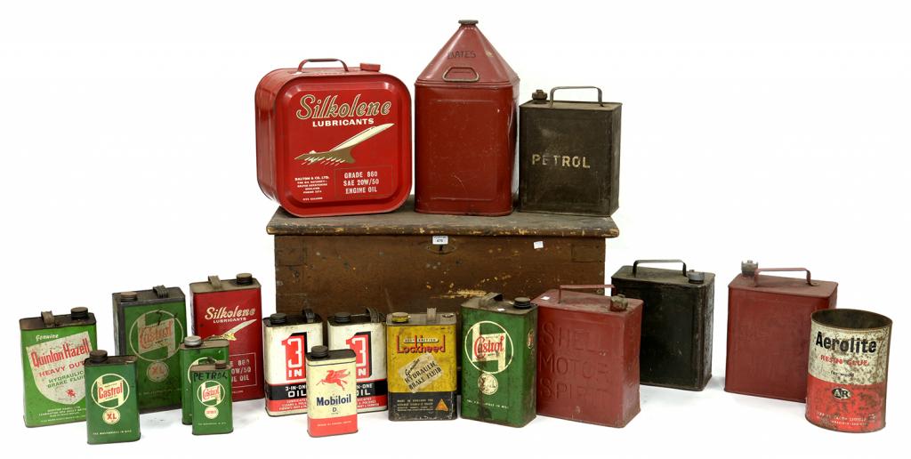 VINTAGE MOTORING. THREE ESSO AND OTHER PETROL CANS AND VARIOUS OTHER SILKOLENE, CASTROL AND OTHER