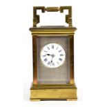 A FRENCH BRASS CARRIAGE CLOCK, THE ENAMEL DIAL WITH SILVERED, ENGINE TURNED MASK IN ANGLAISE CASE,