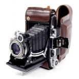 A ZEISS IKON SUPER IKONTA CAMERA WITH MAKER'S TESSAR F3.5 105MM LENS, IN LEATHER EVER READY CASE