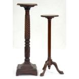 TWO MAHOGANY TORCHERE