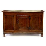 AN OAK DRESSER WITH PANELLED DOOR, 132CM W