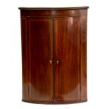 A VICTORIAN MAHOGANY AND LINE INLAID BOW FRONTED CORNER CUPBOARD, 100 CM H