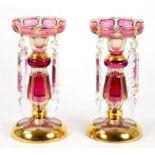 A PAIR OF RUBY FLASHED AND GILT GLASS LUSTRES, WITH SEAWEED GILDING, 22CM H, 20TH CENTURY