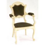 A WHITE PAINTED ARMCHAIR