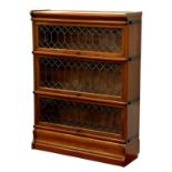A MAHOGNAY GLOBE WERNICKE BOOKCASE WITH LEADED GLASS DOORS, 115 X 87CM