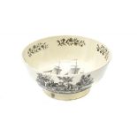 AN ENGLISH CREAMWARE PUNCH BOWL, 19TH C with ship and other black transfer prints, 29.5cm diam ++