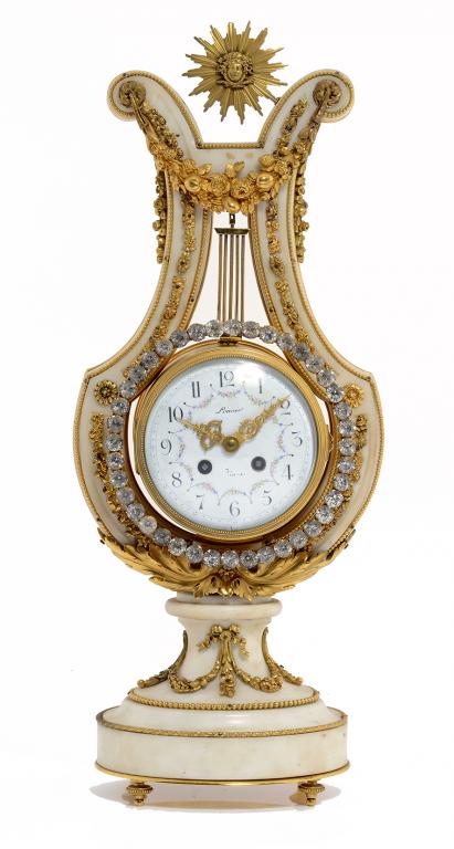 A FRENCH ORMOLU MOUNTED MARBLE LYRE CLOCK IN LOUIS XVI STYLE, LATE 19TH C with swinging paste set
