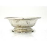 A HAROLD STABLER SILVER FOOTED BOWL 22cm diam, maker's mark and marked STABLER, London 1929,