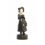 PETER TERESZCZUK (1875-1963). A PATINATED BRONZE AND CARVED IVORY FIGURE, C1925 15.5cm h ++In fine