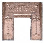 AN ARTS & CRAFTS COPPER REPOUSSÉ FIRE SURROUND, C1905 backed on cast iron, 96cm h x 96cm w ++In good