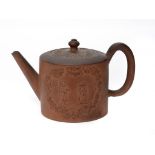 A STAFFORDSHIRE REDWARE CYLINDRICAL TEAPOT AND COVER, c1770 with vented knop, sprigged to either