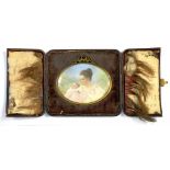 AN EARLY 20TH CENTURY PORTRAIT MINIATURE OF A YOUNG WOMAN WITH HER BABY BEFORE BLOSSOM, IVORY, OVAL,