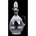 AN EDWARD VII SILVER MOUNTED CUT GLASS CLARET JUG AND STOPPER, 26CM H, LONDON 1906