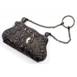 AN EDWARD VII SILVER PURSE OF FOLIATE EMBOSSED BAG SHAPE AND IN UNUSUALLY FINE CONDITION, WITH