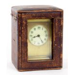 A FRENCH BRASS CARRIAGE CLOCK, THE TIMEPIECE WITH PRIMROSE ENAMEL DIAL, 11CM H EXCLUDING HANDLE,