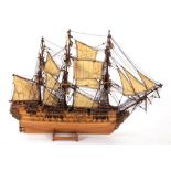 A WOODEN MODEL OF AN 18TH CENTURY MAN 'O' WAR, WITH MASTS, SAILS AND RIGGING, 42CM H, 20TH CENTURY