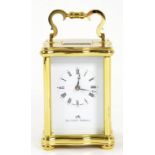 A MATTHEW NORMAN BRASS CARRIAGE CLOCK, THE TIMEPIECE WITH PLATFORM LEVER ESCAPEMENT IN SERPENTINE