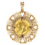GOLD COIN. SOVEREIGN 1912, SET IN A GOLD PENDANT, 14.5 G