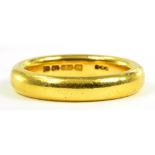 A 22CT GOLD WEDDING RING, 7.3G