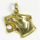 A GOLD LEOPARD'S HEAD PENDANT, MARKED 14, 6.1G
