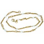A 9CT GOLD NECKLACE WITH CULTURED PEARLS AT INTERVALS, 12.2G GROSS