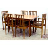 A MEREDEW 1970'S TEAK EXTENDING DINING TABLE AND A SET OF SIX TEAK DINING CHAIRS