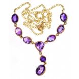 AN AMETHYST NECKLET IN 9CT GOLD, 5.8G GROSS