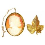 A CAMEO BROOCH IN GOLD, MARKED 9CT, 12G GROSS AND A 9CT GOLD LEAF BROOCH, 6G