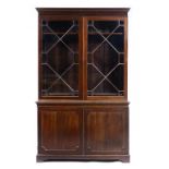 A MAHOGANY BOOKCASE, 19TH C with adjustable shelves enclosed by glazed or panelled doors, 226cm h;