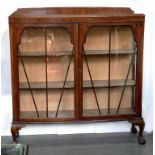 A MAHOGANY BOW FRONTED CHINA CABINET, ON CLAW AND BALL FEET, 120CM H X 118CM X 35CM