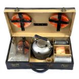 A SIRRAM PICNIC CASE, WITH METAL AND MARBLED PLASTIC CONTENTS, INCLUDING KETTLE, CANISTERS, BOX