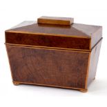 A 19TH CENTURY EXOTIC WOOD AND LINE INLAID TEA CADDY OF SARCOPHAGUS SHAPE, 26CM W