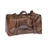 A VINTAGE LEATHER KIT BAG, EARLY 20TH C with brass mounts and lock marked SECURE LEVER, leather