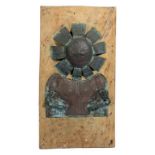 A SHEET BRASS WALL RELIEF OF A SUN DEITY, 20TH CENTURY with articulated cast brass bent arms, nailed