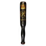 A VICTORIAN PAINTED WOOD TRUNCHEON painted in polychrome with crown, VR cipher and inscribed