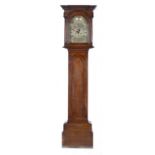 AN OAK EIGHT DAY LONGCASE CLOCK, 18TH/EARLY 19TH C the brass breakarched dial with matted and