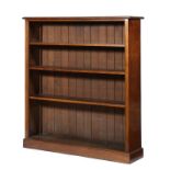 A VICTORIAN WALNUT OPEN BOOKCASE, C1900 with adjustable shelves and boarded back, 137cm h; 33 x