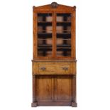 A VICTORIAN MAHOGANY SECRETAIRE BOOKCASE, C1850 the bookcase with adjustble shelves and crested by a