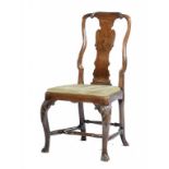 A GEORGE I WALNUT SPOON BACK CHAIR, c1730 on acanthus carved forelegs, 100cm h ++Old scratches and