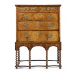 A GEORGE II WALNUT CHEST ON STAND the chest with oak sides, 132cm h; 55 x 97cm ++Brass handles and