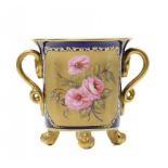 A SAMPSON HANCOCK COBALT GROUND CABINET CUP, C1900 painted with roses on a gilt panel, 8cm h, red