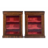 A PAIR OF VICTORIAN ROSEWOOD PIER CABINETS, C1880 with banded frieze and uprights flanking the