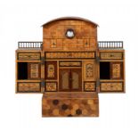 A FINE JAPANESE PARQUETRY TABLE CABINET IN THE FORM OF A HOUSE, MEIJI PERIOD the arched pediment