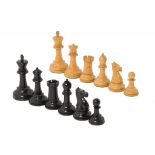 A J JACQUES & SON LTD STAUNTON PATTERN CHESS SET, EARLY 20TH C of boxwood and ebony, kings 8.5cm h