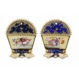 A PAIR OF COALPORT CARD RACKS, C1820 painted with a basket of flowers on a marble ledge beneath