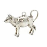 A GERMAN CAST SILVER COW CREAMER AND COVER, 19TH C 8.5cm h, indistinctly marked on cover, 5ozs ++